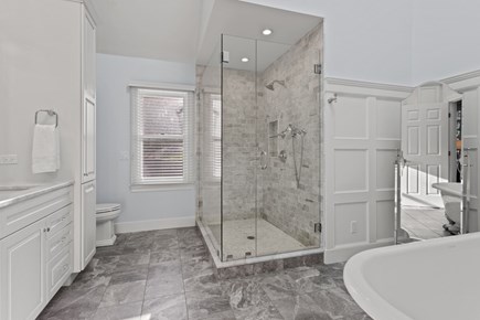 Orleans Cape Cod vacation rental - Primary Bath on the main level with soaking tub and dual vanities...