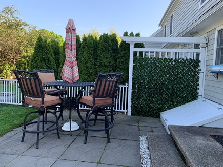 Falmouth Cape Cod vacation rental - Grilling with family on the Patio Side.