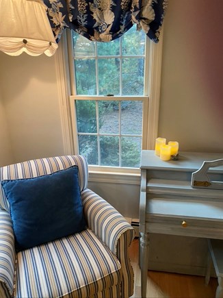 Eastham Cape Cod vacation rental - Comfy club chair by piano at the far end of the kitchen/dining