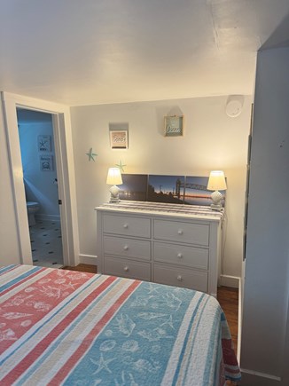 Brewster,  On private road in downtown B Cape Cod vacation rental - Master bedroom with able storage.