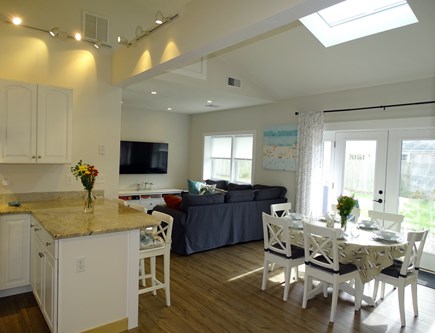 Falmouth Cape Cod vacation rental - Vaulted living area with skylight; opens to the backyard patio