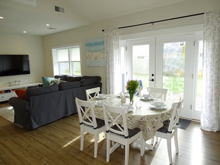 Falmouth Cape Cod vacation rental - Dining area opens through French doors to back yard, new patio