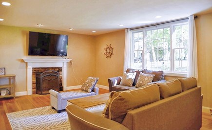 Hyannis Cape Cod vacation rental - Spacious, bright living room w/fireplace & smart TV