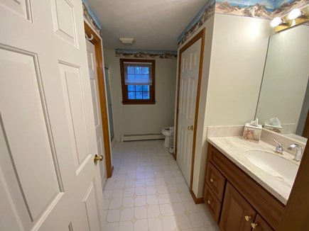 East Harwich Cape Cod vacation rental - Primary Bathroom with Full Size Washer and Dryer.