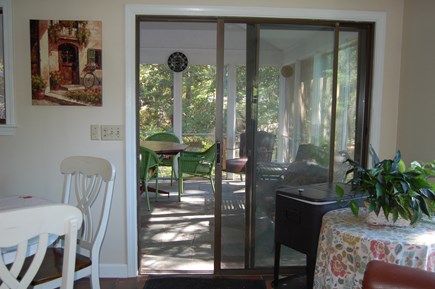 Sandwich Cape Cod vacation rental - Kitchen table with view of screened patio