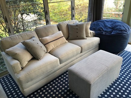 Brewster Cape Cod vacation rental - Sun room with couch and ottoman which can be used for additional seating