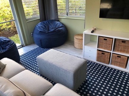Brewster Cape Cod vacation rental - Couch faces wall-mounted TV,  Oversized bean bag chairs ae a kid favorite.