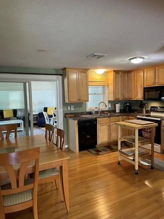 South Yarmouth Cape Cod vacation rental - Open Kitchen leading to three season room.