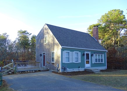 Harwich Cape Cod vacation rental - Well-kept classic Cape exterior with 20x12 attached deck
