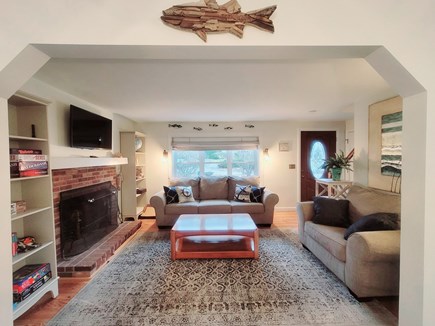 Harwich Cape Cod vacation rental - Living room with 42 in tv mounted over fireplace