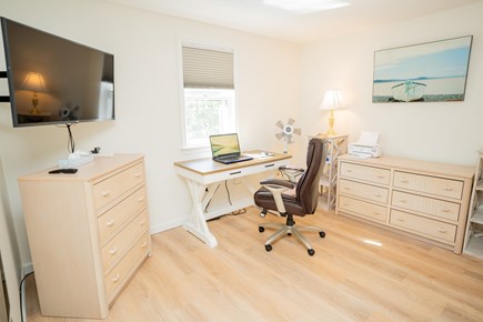 Harwich Cape Cod vacation rental - CAPT's Quarters - workstation with printer, 42-in smart tv.