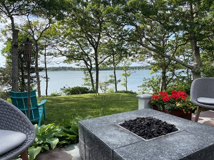 Orleans Cape Cod vacation rental - Front patio firepit with water view