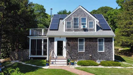 Orleans Cape Cod vacation rental - Large windows and glass doors fill the house with light.