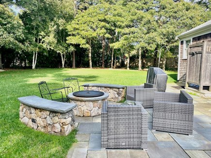 East Orleans Cape Cod vacation rental - Expansive fenced-in yard w/deck & wonderful patio with fire pit