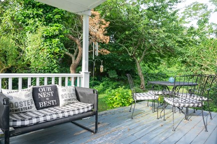 Dennis Port Cape Cod vacation rental - Side of porch for outdoor dining.