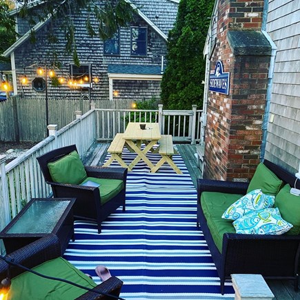 Dennis Port Cape Cod vacation rental - Couches and a table on the deck!
