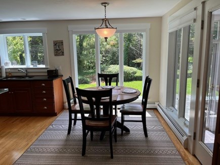 Dennis, Corporation Beach Cape Cod vacation rental - Seating for four in the kitchen overlooking the backyard