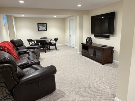 Dennis, Corporation Beach Cape Cod vacation rental - Finished basement with work table and 60" smart TV