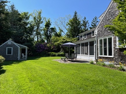Dennis, Corporation Beach Cape Cod vacation rental - Private backyard with studio and patio area