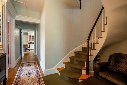 Falmouth, Main + Guest House Cape Cod vacation rental - Hallway to kitchen and stairs to 2nd floor