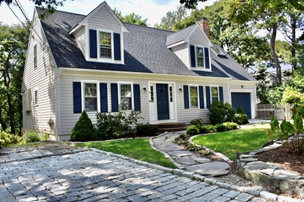 Harwich Port Cape Cod vacation rental - Front of the house. Double granite driveways.