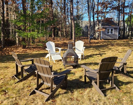 West Yarmouth Cape Cod vacation rental - Side Yard with Fire Pit