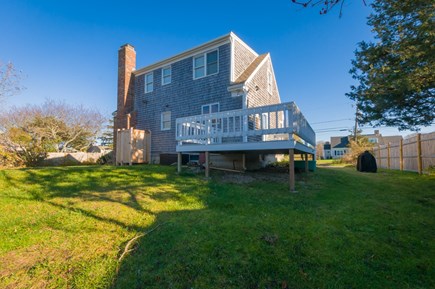East Sandwich Cape Cod vacation rental - Deck wraps around to the back yard with outdoor shower
