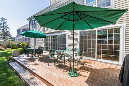 Falmouth Heights Cape Cod vacation rental - Back deck with grill and seating for outdoor dining