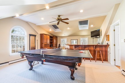 Falmouth Heights Cape Cod vacation rental - Game Room with Pool or Ping Pong, TV, and Bar