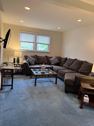 West Yarmouth Cape Cod vacation rental - Den area with large sectional and 42” TV