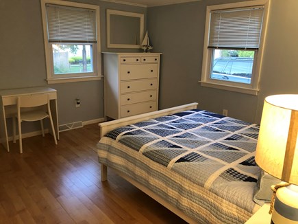 West Yarmouth Cape Cod vacation rental - Master Bedroom - Queen bed, dresser, end tables, & vanity