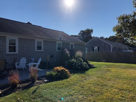 South Yarmouth Cape Cod vacation rental - Back patio and outside shower.