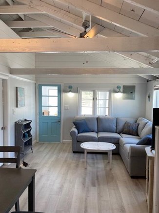 Dennis Port Cape Cod vacation rental - Living room has sectional sofa and smart TV with cable