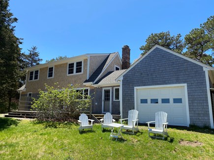 Brewster Cape Cod vacation rental - Back of residence with deck and additional seating