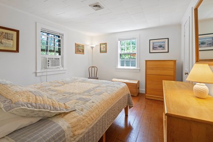 Dennis Port Cape Cod vacation rental - Main bedroom with queen bed and window A/C