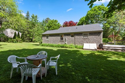 Dennis Port Cape Cod vacation rental - Backyard with shady seating