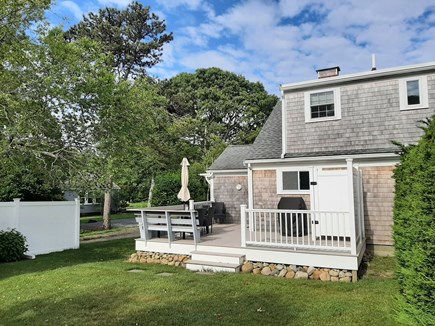 Dennis Port Cape Cod vacation rental - Back deck with table, gas grill and outdoor shower!