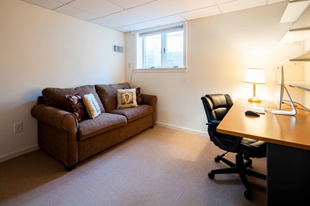 Orleans, Chestnut Grove Cape Cod vacation rental - Finished basement with pullout sofa and desk for remote working