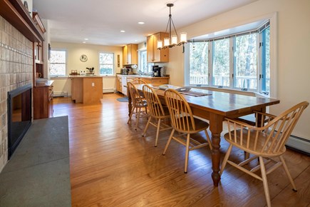 Chestnut Grove, East Orleans Cape Cod vacation rental - Dining Area off Kitchen with fireplace