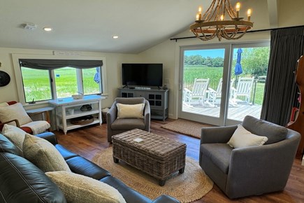 Barnstable Cape Cod vacation rental - Family room w/ cable TV and access to deck and backyard