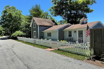 Barnstable Cape Cod vacation rental - Front of the home w/ picket fence and lovely plantings