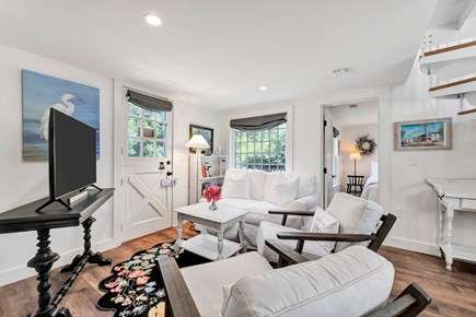 Barnstable Cape Cod vacation rental - Sitting area with cable TV next to kitchen