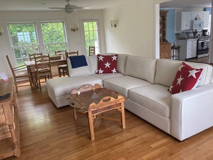 East Orleans Cape Cod vacation rental - The spacious family room and dining area with easy kitchen access