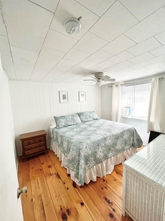 Popponesset Cape Cod vacation rental - Bedroom #1- King bedroom, shelving and closet space with TV