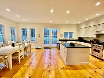 Dennis Cape Cod vacation rental - Eat in kitchen and doors to yard and pool.
