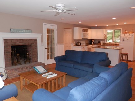 Brewster Cape Cod vacation rental - Living area opens to kitchen and dining
