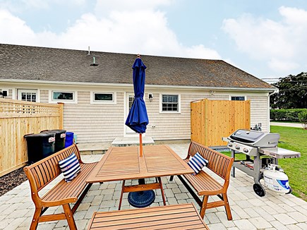 Falmouth Cape Cod vacation rental - Private patio with outdoor shower, weber gas grill & dining table