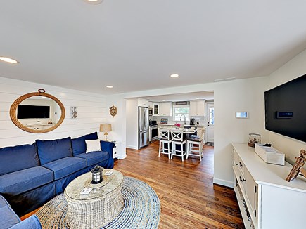 Falmouth Cape Cod vacation rental - Cozy living room with large sectional and flatscreen TV