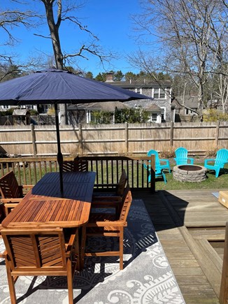 South Dennis Cape Cod vacation rental - Enjoy dining at the new outdoor table, or relax by the firepit