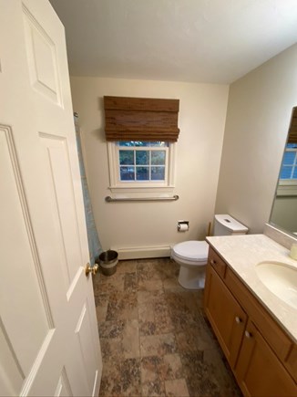 Eastham, Chloe's Classic Cape Cape Cod vacation rental - upstairs bathroom with shower over tub